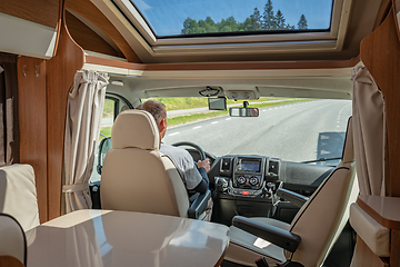 Image showing Man driving on a road in the Camper Van RV