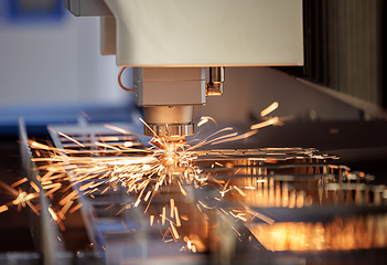 Image showing CNC Laser cutting of metal, modern industrial technology.