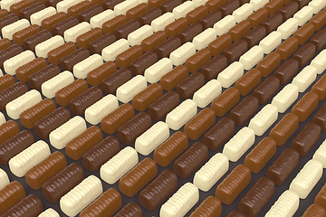 Image showing Dark, milk and white chocolate pralines