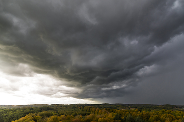 Image showing Storm clouds over the forest