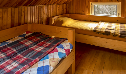 Image showing Bedroom in a Wooden Chalet