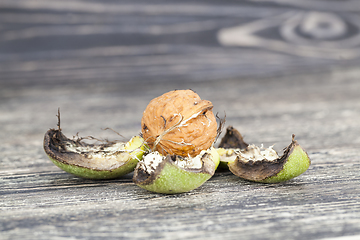 Image showing Walnuts on a wooden table