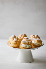 Image showing plate of cream puffs