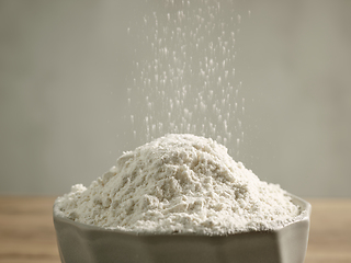 Image showing flour pouring into bowl