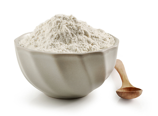 Image showing bowl of flour and wooden spoon