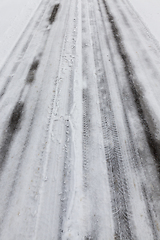 Image showing Snow drifts in winter road