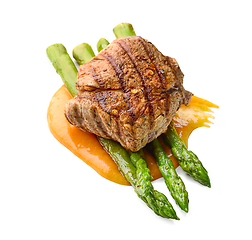 Image showing grilled pork steak and asparagus