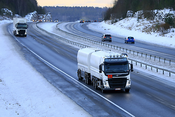 Image showing White Volvo FM Fuel Tanker in Motorway Traffic