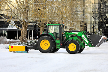 Image showing John Deere Tractor Removing Snow with Front End Loader and Rear 