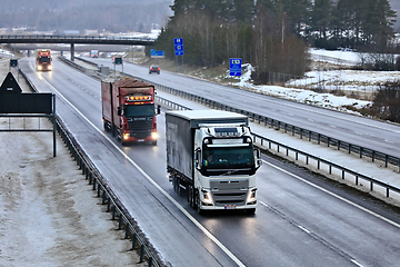 Image showing Freight Trucks on Motorway on a Foggy Day of Winter