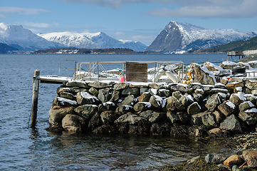 Image showing harbor with snow and mountains