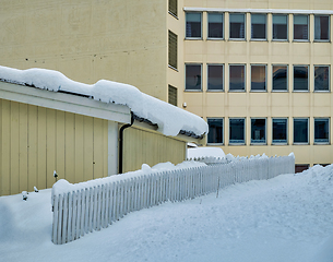 Image showing old office building with glass and snow