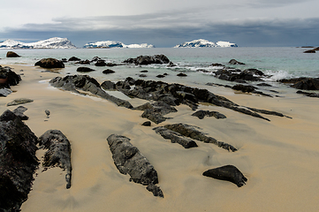 Image showing rocks in the sand on the beach