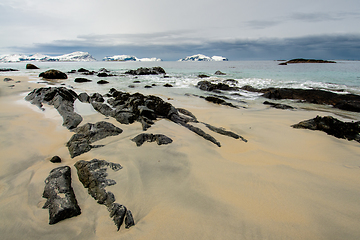 Image showing rocks in the sand on the beach