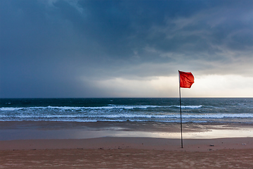 Image showing Storm warning flags on beach. Baga, Goa, India