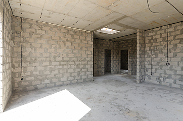 Image showing Construction of an individual residential building, a large spacious room with a concrete floor and reinforced concrete ceilings