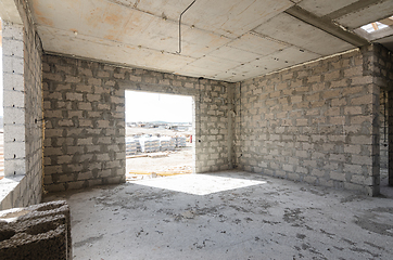 Image showing Construction of an individual residential building, view of a spacious room with a huge window opening