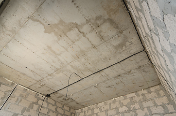 Image showing Construction of an individual residential building, view of the monolithic reinforced concrete ceiling in the room