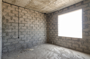 Image showing Construction of an individual residential building, view of two walls, blind interior and exterior with a window opening