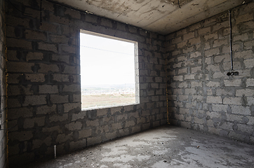 Image showing Construction of an individual residential building, wall view with a square large window opening