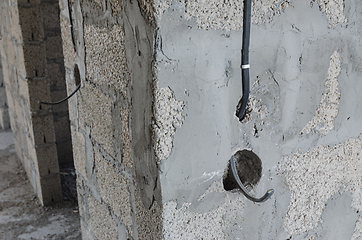 Image showing Electrical wiring for mounting a switch during the construction of a private residential building