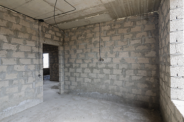 Image showing Construction of an individual residential building, view of the walls of the room between the doorway and the window