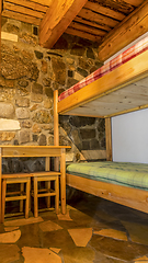 Image showing Bedroom in a Wooden Chalet