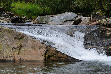 Image showing small waterfall in river