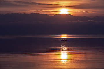 Image showing Sunrise with sea and mountains, landscape 