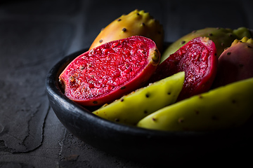 Image showing Prickly pear in black bowl on black background