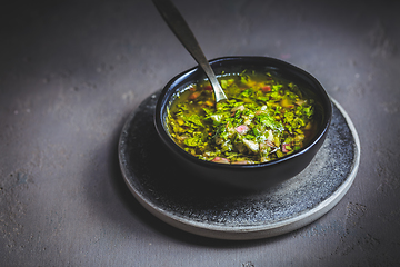 Image showing Chimichurri verde - Fresh traditional chimichurri sauce for barbecue meat