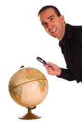 Image showing Examining Earth