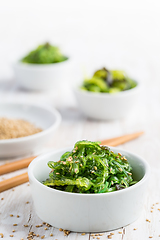 Image showing Wakame seaweed salad with sesame seeds. Traditional Japanese foo