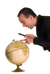 Image showing Man Looking At Globe