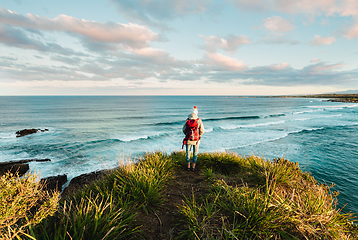 Image showing Watching the ocean as the sun begins to set