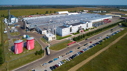 Image showing Velyka Dymerka, Ukraine - April 30, 2018: Coca-Cola bottling plant in Velyka Dymerka, Ukraine. Coca Cola is an American multinational food, snack and beverage corporation