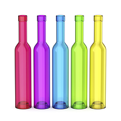 Image showing Five tall empty glass bottles