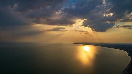 Image showing Aerial photo from flying drone of a fascinating nature landscape with dramatic evening sunset sky