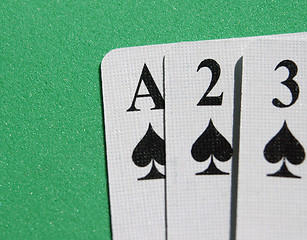 Image showing Spades in a row