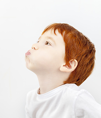 Image showing boy puffed cheeks