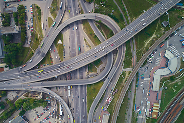 Image showing Aerial view of highway and overpass in city.