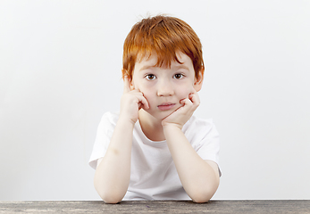 Image showing portrait of a boy , tired look