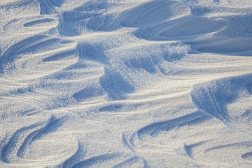 Image showing Snowdrifts in a field in winter