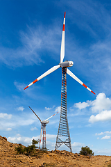 Image showing Wind generator turbines sihouettes