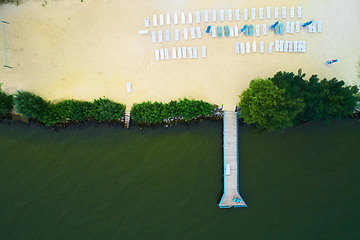 Image showing Aerial view of a beach with sunbeds.