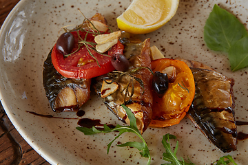 Image showing The fried mackerel with vegetables. Shallow dof.