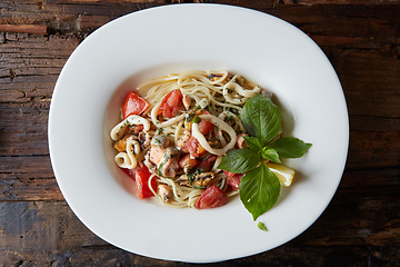 Image showing Seafood pasta Spaghetti with Clams, Prawns, Seafood Cocktail close up