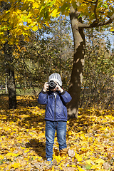 Image showing little boy with a camera