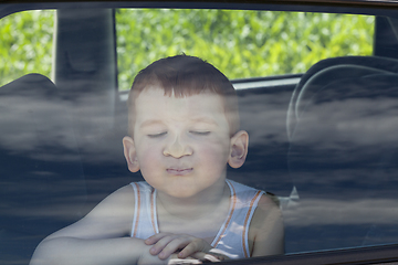 Image showing the boy pressed his nose