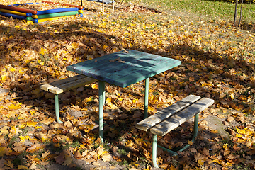 Image showing autumn bench table